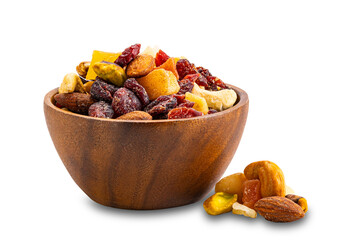 Breakfast mix nuts and fruits in wooden bowl and pile on the floor isolated on white background...