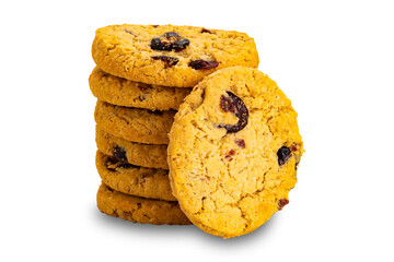 Stack of crispy homemade oat flakes and cranberry biscuits isolated on white background with clipping path.