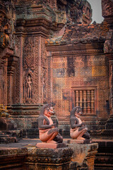 Naklejka premium The god animal statue and beautiful carving in Banteay Srei Temple in Siem Reap, Cambodia