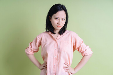 Obraz premium Photo of young Asian woman on background