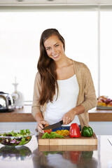 Woman, kitchen and vegetables for nutrition in portrait, diet and food preparation for cooking....