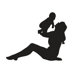 Mother holding her newborn, silhouette