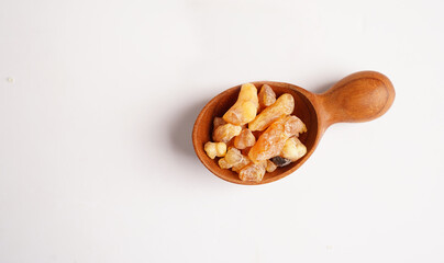 Frankincense or olibanum aromatic resin used in incense and perfumes.