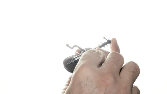 Playing the world's smallest violin (tiny miniature toy): a peculiar ironic phrase to diminish the weight of another's grievances or to convey disregard to their problems.