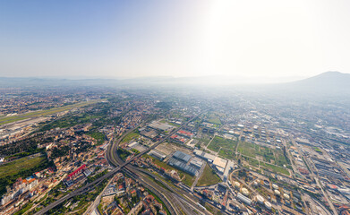 Naples, Italy. Industrial area of the city. Airport. Panorama of the city on a summer day. Sunny weather. Aerial view