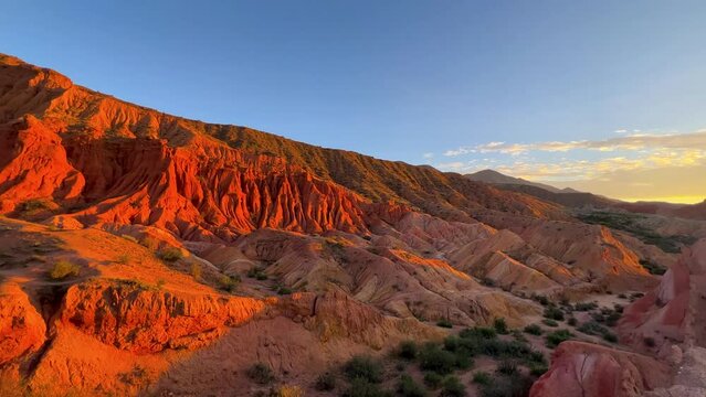 A fabulous canyon in Central Asia. Scenic view of a beautiful textured multi-layered canyon. Mountain ranges in a fabulous canyon at sunset near Lake Issyk-Kul in Karakol. 4K