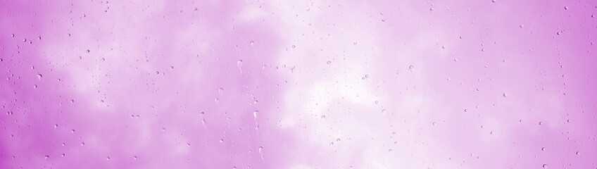 Raindrops, Water Drops, Rain on a Glass Pane, Rainy Weather with Clouds, Pink Background	