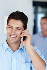 Man, smile and cellphone for phone call at office as consultant for conversation and assist client. Closeup, work and happy with discussion for connection and networking for startup business