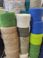 heap of colorful yarn wool at store.