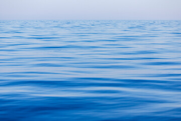 The calm waters of the Mediterranean Sea, in the early morning