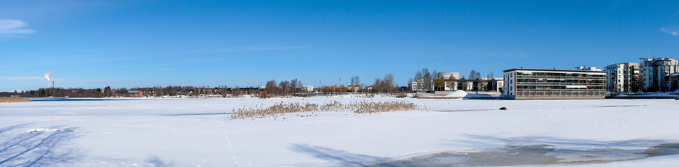 Fototapeta na wymiar Panoramic early spring scenery in Oulu, Finland