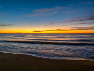 Fototapeta na wymiar Sunrise at the seaside with high cloud
