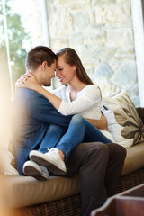Home, couple and forehead for love, embrace and romance or care on couch in living room. Happy...