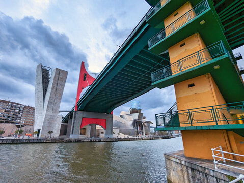 Bilbao, Spain; march 27th 2024: Salbeko zubia or La Salve bridge and Guggenheim Bilbao Museum in background
