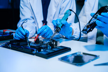 Close up of Technician measuring voltage electronic circuit board, Service after sale fix electric...