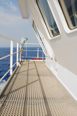 A merchant ship underway at sea during sunny day