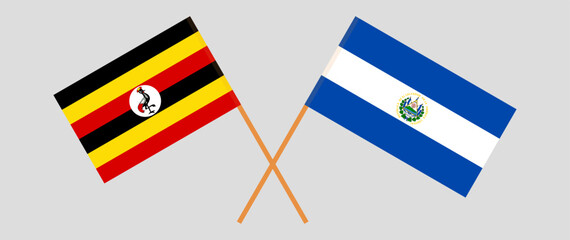 Crossed flags of Uganda and El Salvador. Official colors. Correct proportion