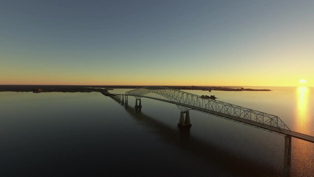 Aerial drone side view at sunset of the Francis Scott Key Bridge - Baltimore and Dundalk in Maryland. United States