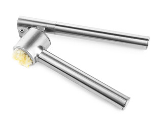 One metal press with crushed garlic isolated on white, above view