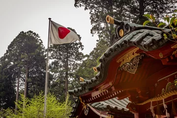 Gordijnen Japanese temple with its flag, Buddhist temple near Mount Fuji, spring on Japan, Japanese flag © Loris