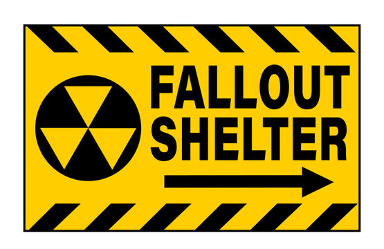 Fallout shelter. Information sign with nuclear symbol, directional arrow and text . Yellow black barricade tape above and below.	