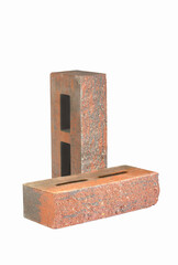 Pair of Aged Red Bricks With Rectangular Wholes for Construction Isolated on White.