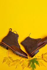 View of Premium Dark Brown Grain Brogue Derby Boots Made of Calf Leather with Rubber Sole Placed With Maple Leaves - 770485925