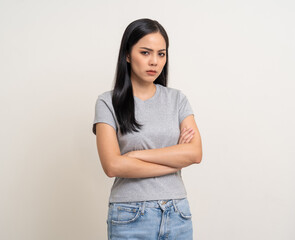 Upset confused bad emotional and thinking asian woman. Unhappy stressed female. Young latin lady standing feeling depressed dramatic scene looking at camera on isolated background.