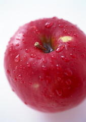red apple with water drops