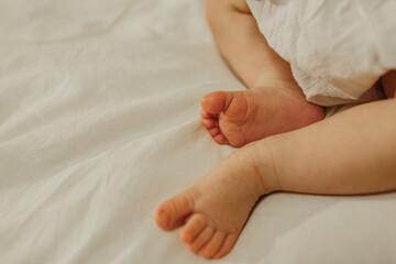 Close up of Baby Laying on Bed