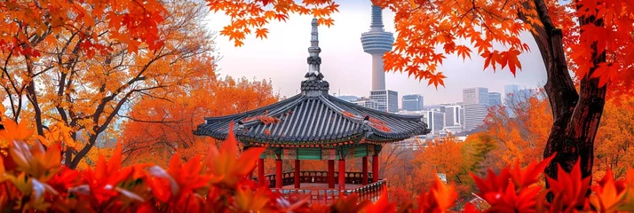 Photo sur Aluminium Rouge Autumn's embrace at Namsan Tower and pavilion, a canvas of fall colors in the heart of Seoul
