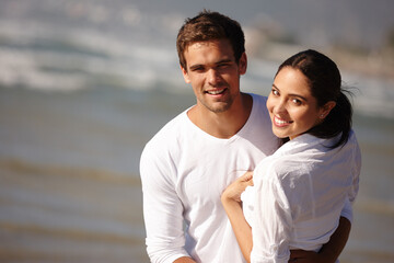 Happy, summer and portrait of couple on beach for bonding, relaxing and relationship by ocean. Dating, travel and man and woman embrace for love on holiday, vacation and romantic weekend in nature