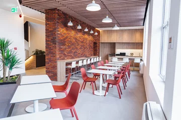 Fotobehang A modern empty canteen in an office building © Jelena