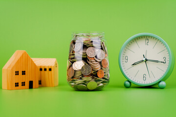 Money and time, savings, coins in a glass jar, financial planning financial investment Income, cash...