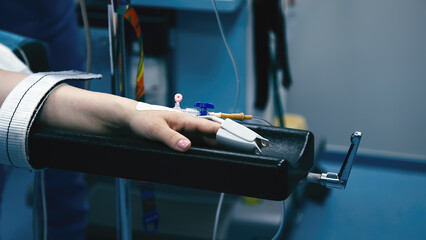 Medical workers prepare a young female patient in the operating room for surgery. Health, surgery...