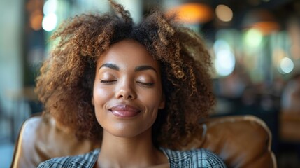 Portrait of a serene young woman with eyes closed and a content smile. - obrazy, fototapety, plakaty