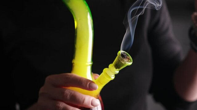 Female Smoking Marijuana Thc And Cbd With Bong For High And Relax, Bad Habit And Addiction Concept