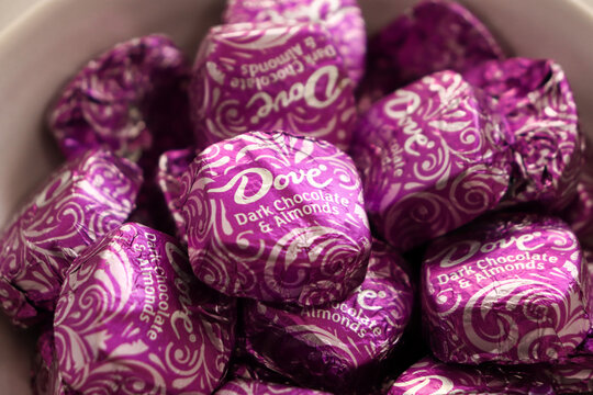 Seattle, Washington, USA- October 17, 2022: Individually Wrapped And Covered Dove Dark Chocolate With Almonds Closeup