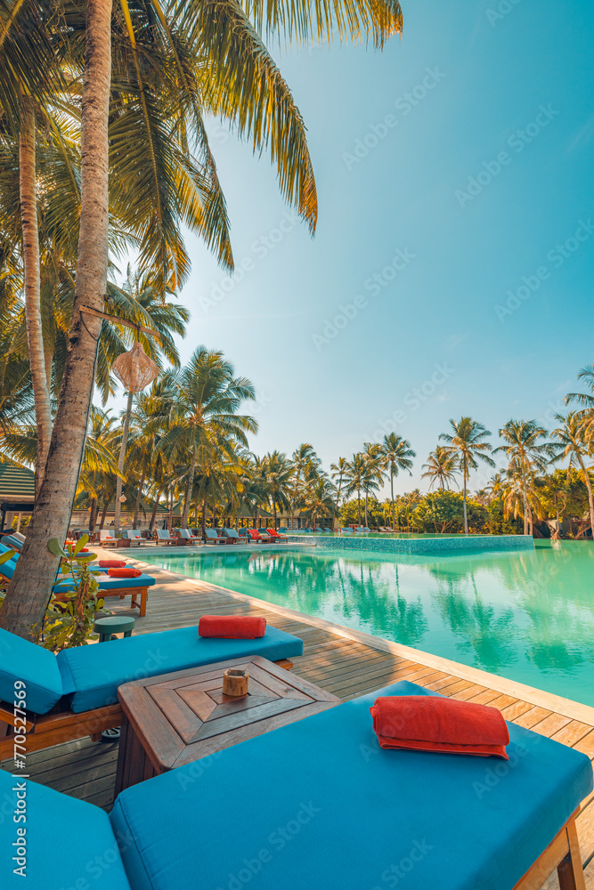 Poster Happy tourism holiday landscape. Luxury beach resort hotel swimming pool, leisure beach chairs under umbrellas palm trees, blue sunny sky. Summer island seaside, relax mood travel vacation background