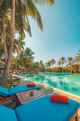 Happy tourism holiday landscape. Luxury beach resort hotel swimming pool, leisure beach chairs under umbrellas palm trees, blue sunny sky. Summer island seaside, relax mood travel vacation background