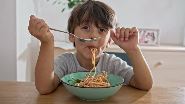 Little Boy Slurps Pasta Like In Cartoons