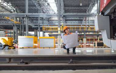 Engineer plan green railway project with infrastructure blueprint, electric train, fuel efficiency