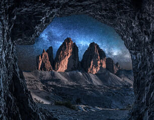 Stunning view to Tre Cime from cave at night, Dolomites