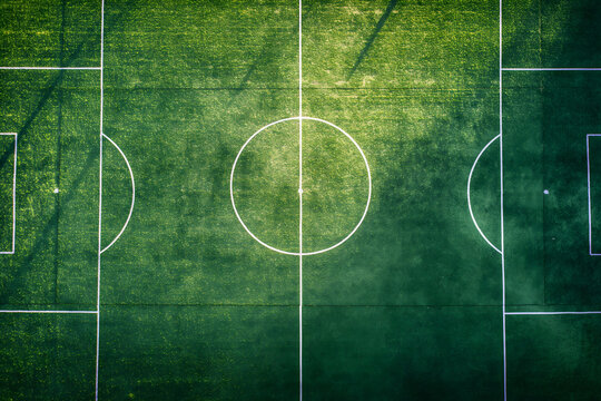 Top view,A soccer field, football field with a white line on the grass