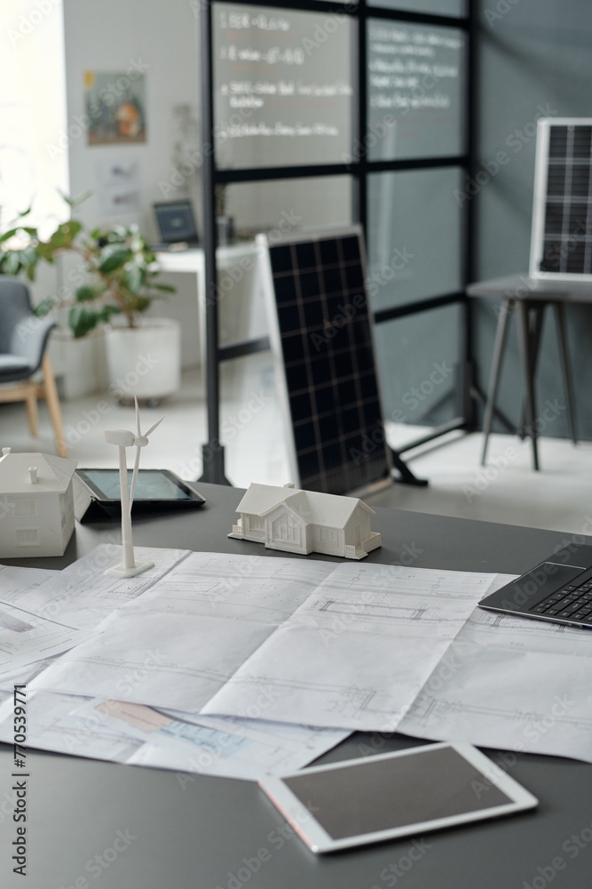 Poster digital tablets, mockups of windmill and houses, unrolled blueprint with sketch of new construction 