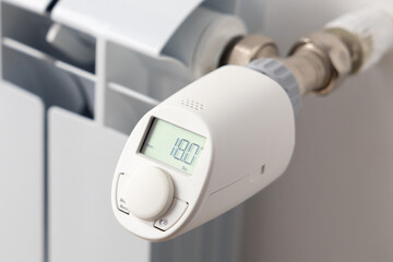 White heating battery and electronic, smart temperature regulator. warmth in the room and the...