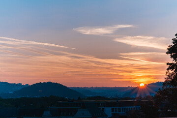 Rising sun on the horizon early in the morning