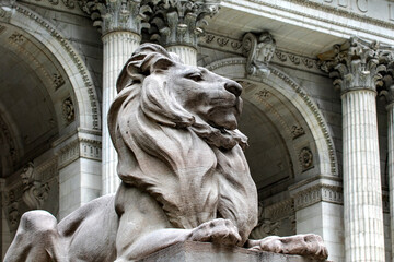 A lion at the entrance and guarding the public library of New York is one of the most important in...