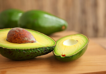 Fresh avocado on wooden background - 770602908