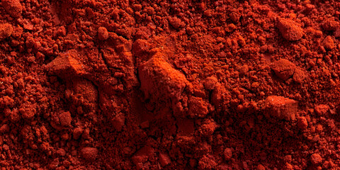 Dark red ground paprika dry chili pepper isolated pepper powder, closeup white background
